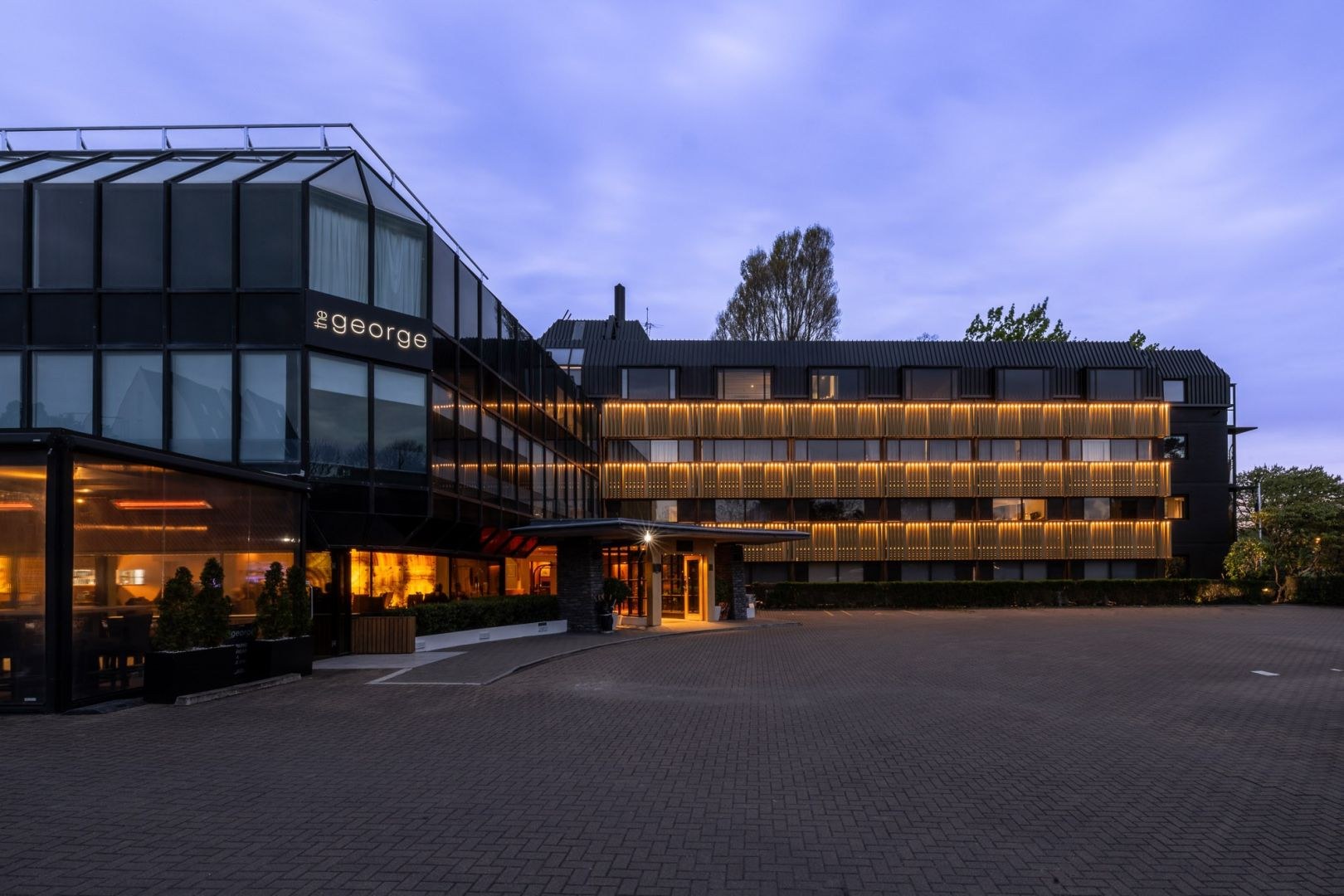 The George hotel exterior at night, Christchurch