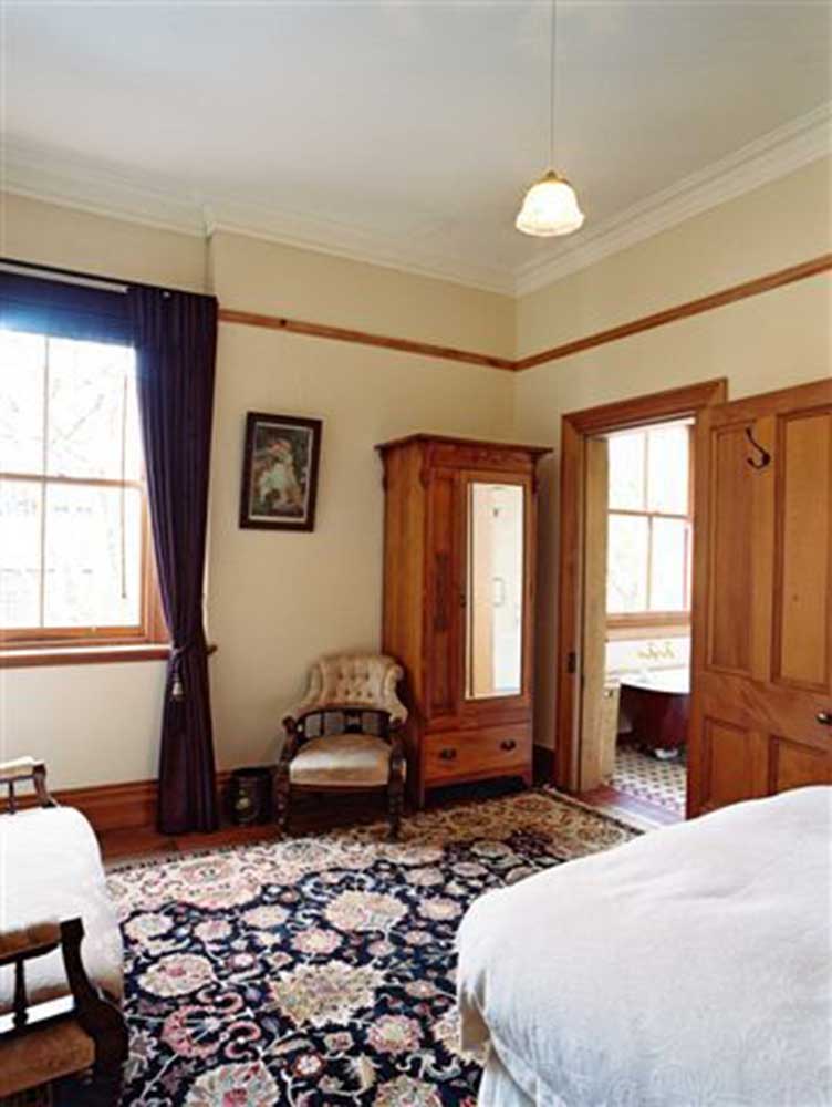 A guest room at Braemar on Parliament Street with Victorian detailing